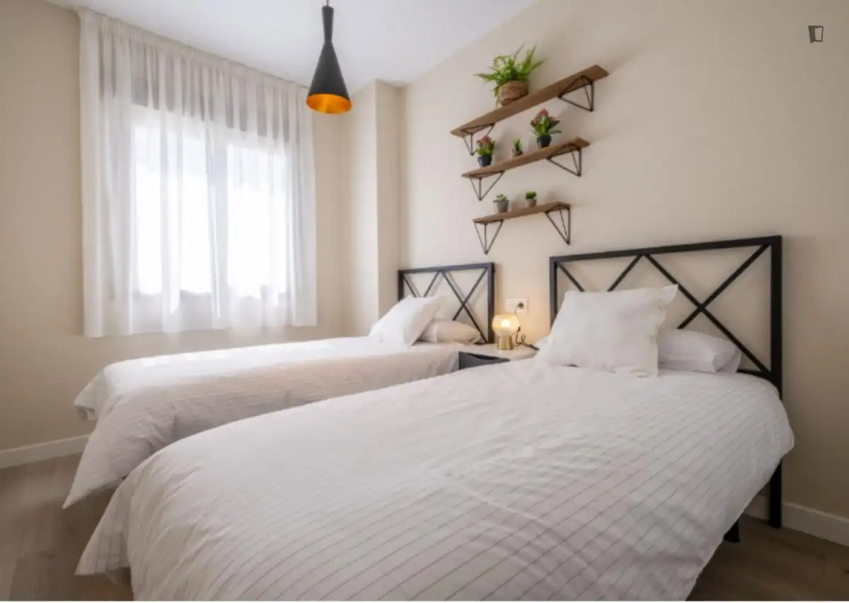 Dormitori de Apartament de lloguer en Málaga amb Aire condicionat, Moblat i Forn