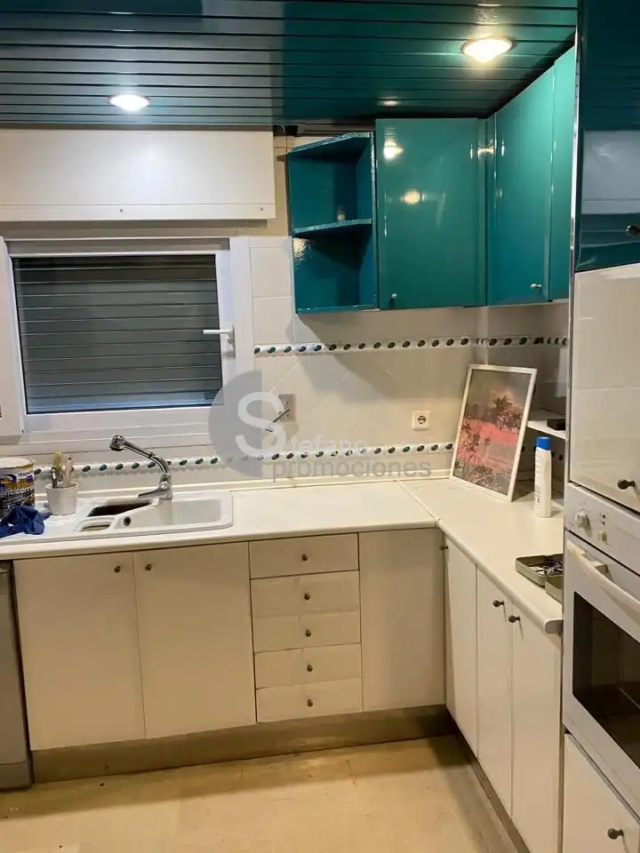 Cocina de Casa adosada de alquiler en Málaga con Aire acondicionado, Jardín privado y Terraza