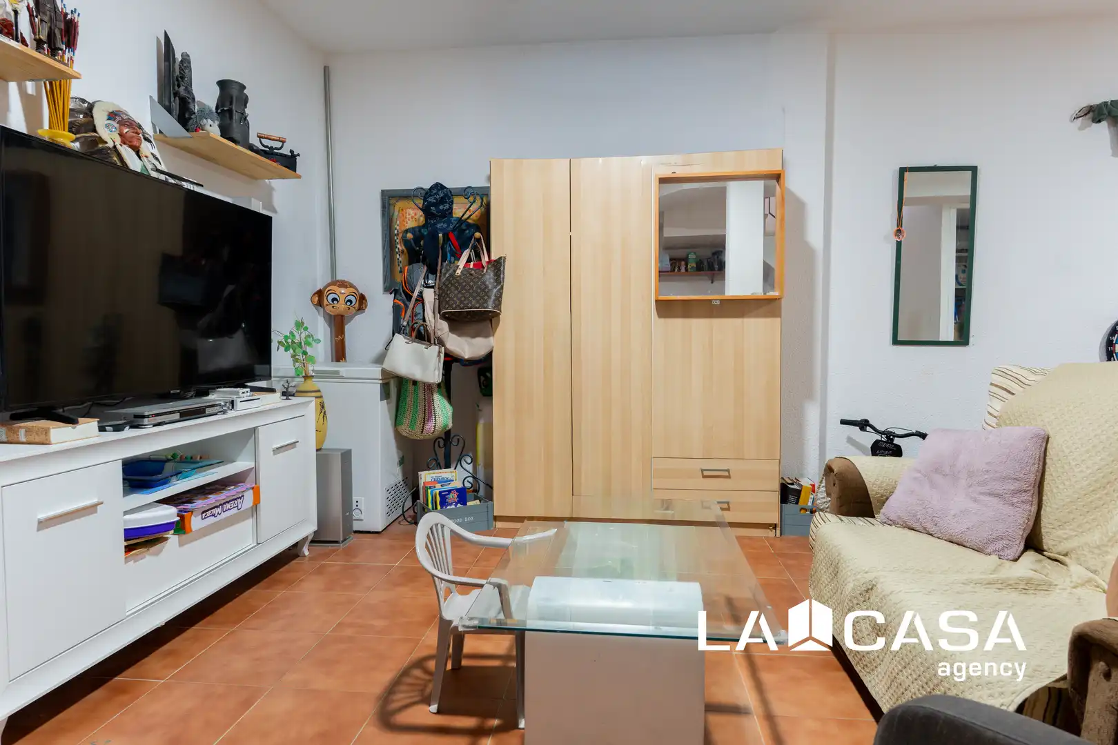 Sala d'estar de Casa adosada en venda en Dos Hermanas amb Aire condicionat i Terrassa