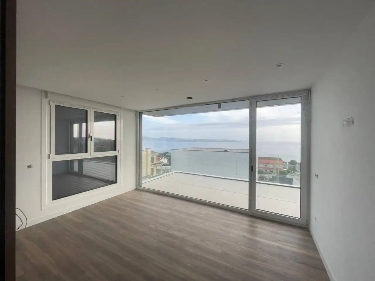 Sala d'estar de Casa o xalet en venda en Sanxenxo amb Aire condicionat, Calefacció i Jardí privat