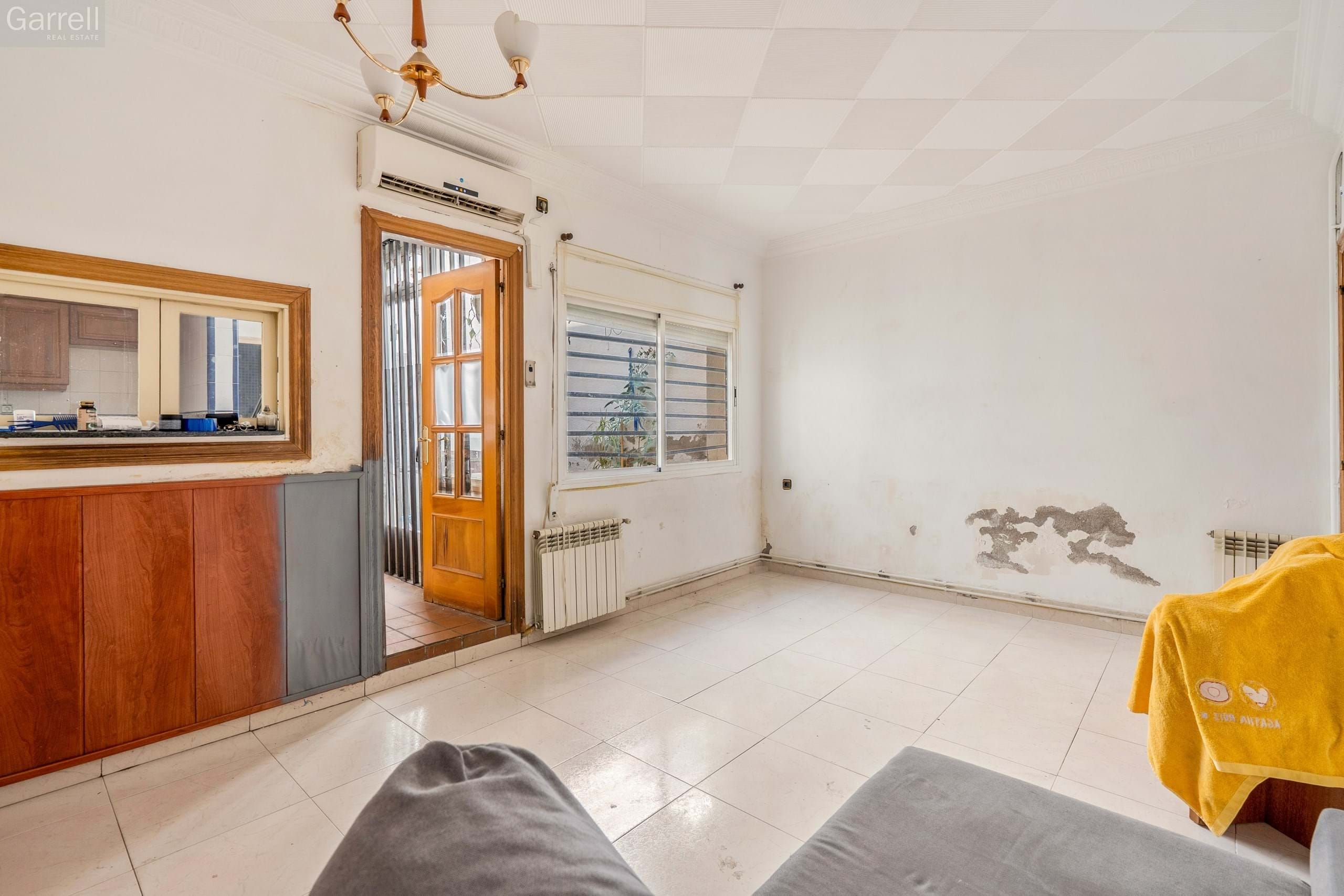 Sala d'estar de Casa adosada en venda en Sabadell amb Terrassa