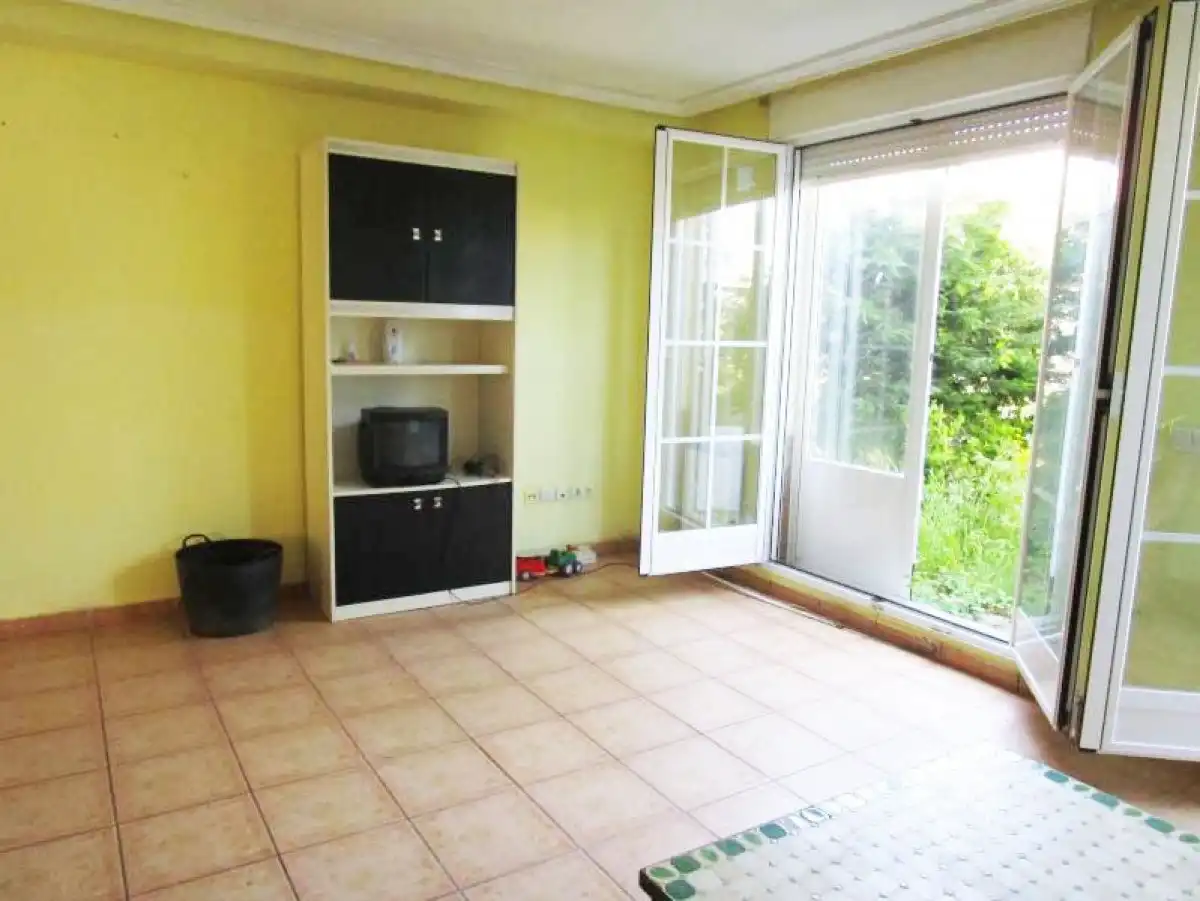 Sala de estar de Casa adosada en venta en Pelabravo con Calefacción, Terraza y Piscina comunitaria