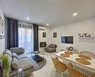 Sala d'estar de Apartament de lloguer en  Barcelona Capital amb Aire condicionat, Terrassa i Balcó