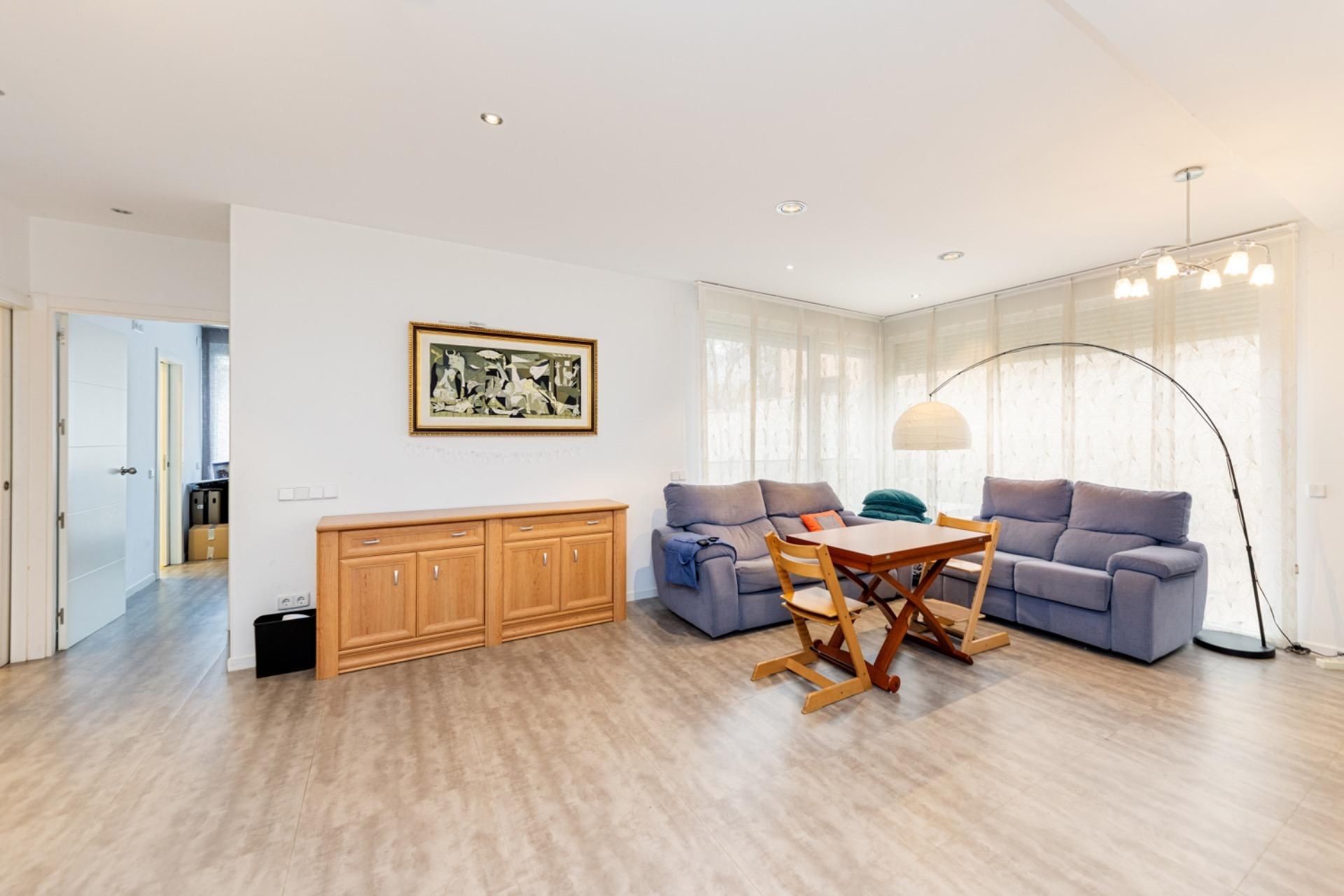 Sala d'estar de Casa adosada en venda en Moralzarzal amb Aire condicionat, Jardí privat i Terrassa