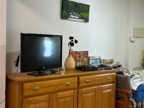 Sala d'estar de Casa adosada en venda en Santa Pola amb Aire condicionat i Balcó