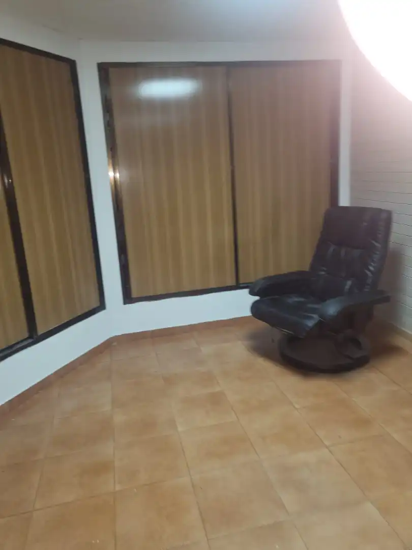 Sala de estar de Casa adosada en venta en Granada con Aire acondicionado, Calefacción y Terraza