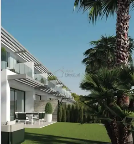 Vista exterior de Casa adosada en venda en Finestrat amb Jardí privat, Terrassa i Piscina comunitària