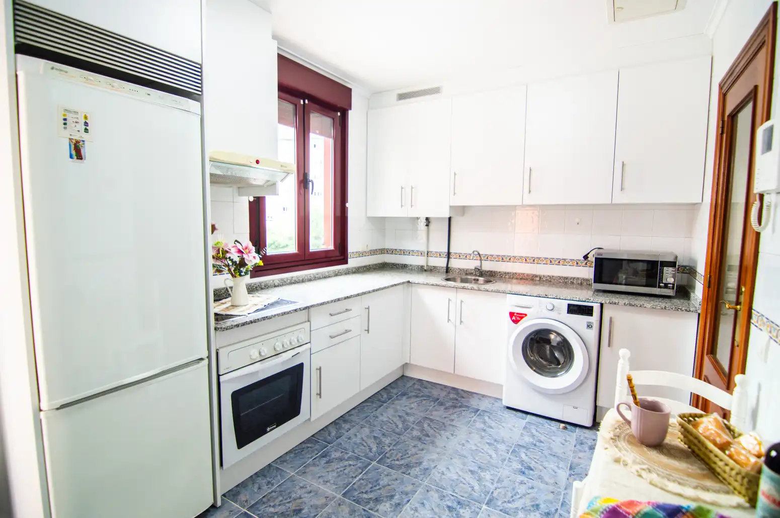 Kitchen of Flat for sale in Oviedo   with Heating, Parquet flooring and Terrace