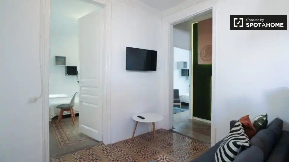 Sala de estar de Piso para compartir en Barcelona con Aire acondicionado, Calefacción y Amueblado