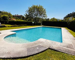 Swimming pool of Apartment for sale in Nigrán