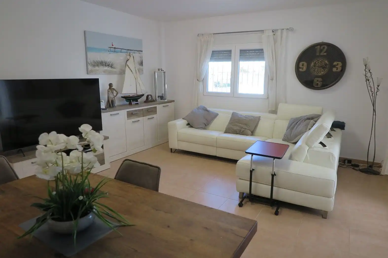 Sala d'estar de Casa o xalet en venda en El Campello amb Aire condicionat, Jardí privat i Terrassa
