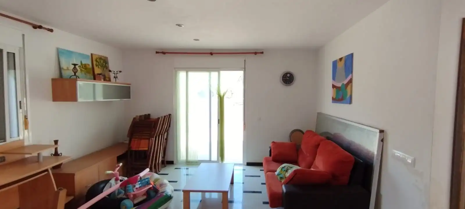 Sala d'estar de Casa adosada en venda en Alcanar amb Parquet, Terrassa i Traster