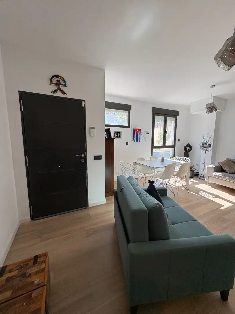 Sala d'estar de Casa adosada en venda en Alcantarilla amb Aire condicionat, Terrassa i Traster