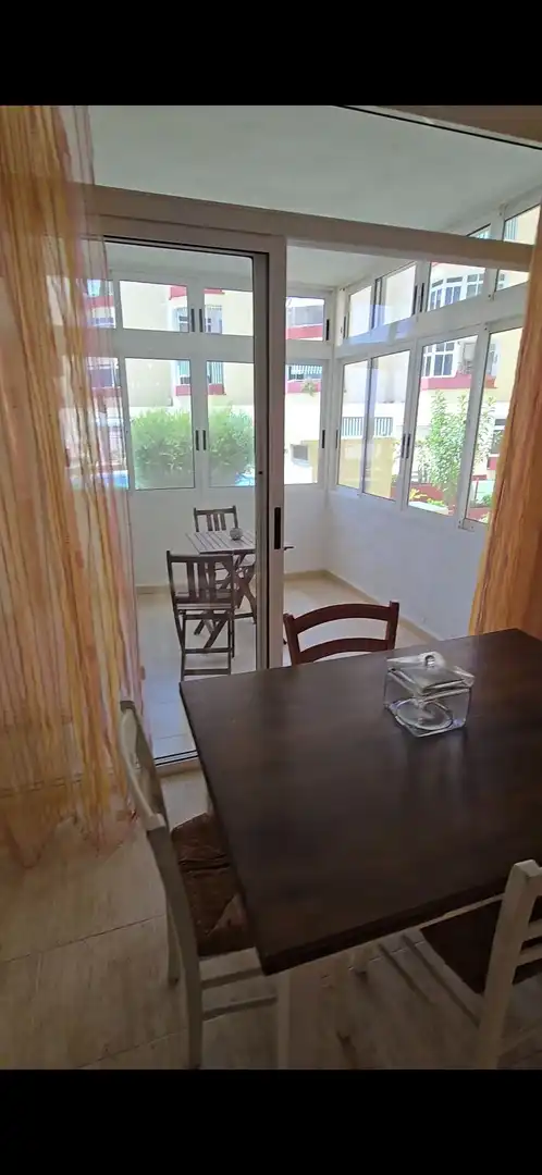 Menjador de Apartament de lloguer en Adeje amb Piscina comunitària