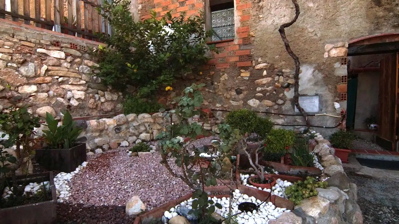 Jardí de Casa adosada en venda en Garcia amb Aire condicionat, Calefacció i Terrassa