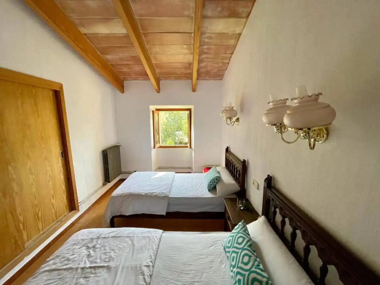 Schlafzimmer von Country house zur Miete in Pollença mit Klimaanlage, Heizung und Privatgarten