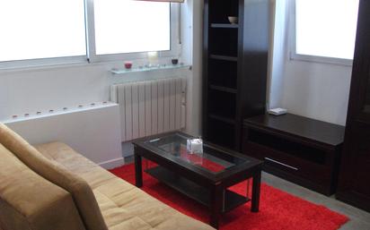 Sala d'estar de Apartament en venda en  Madrid Capital