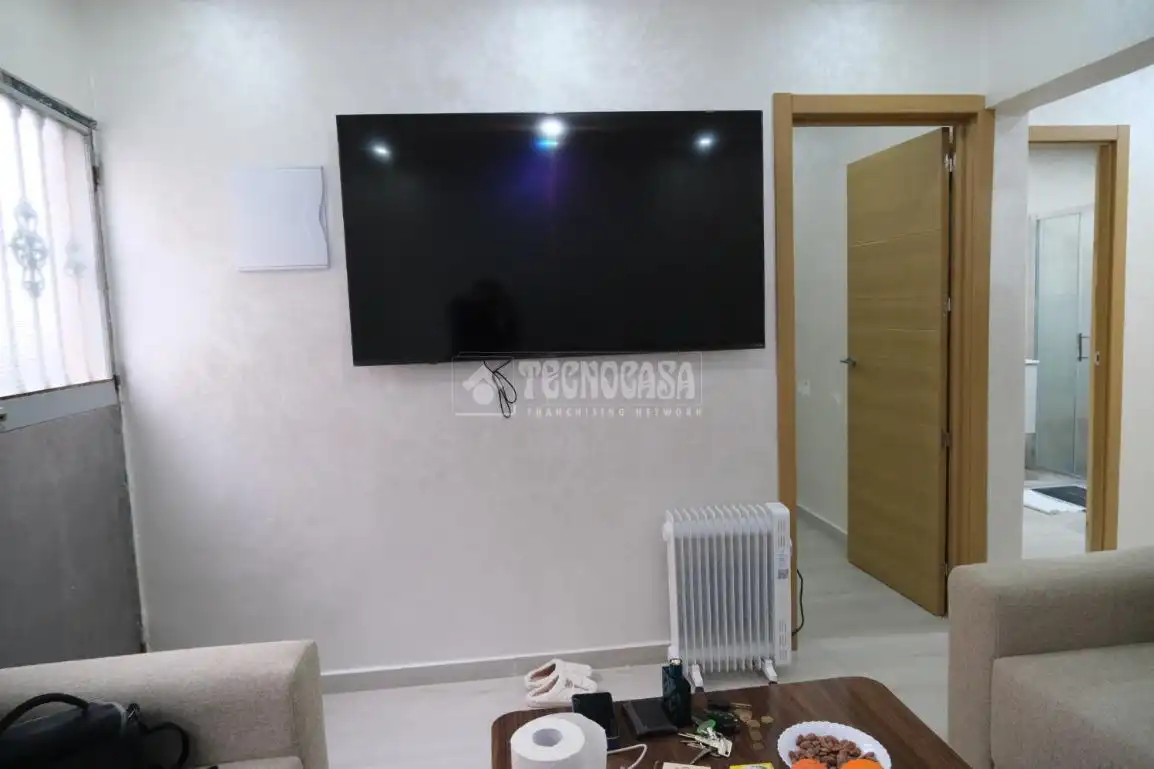 Sala de estar de Casa adosada en venta en Sevilla con Alarma