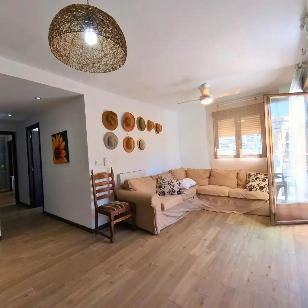 Sala d'estar de Apartament en venda en Salobreña amb Aire condicionat, Jardí privat i Terrassa