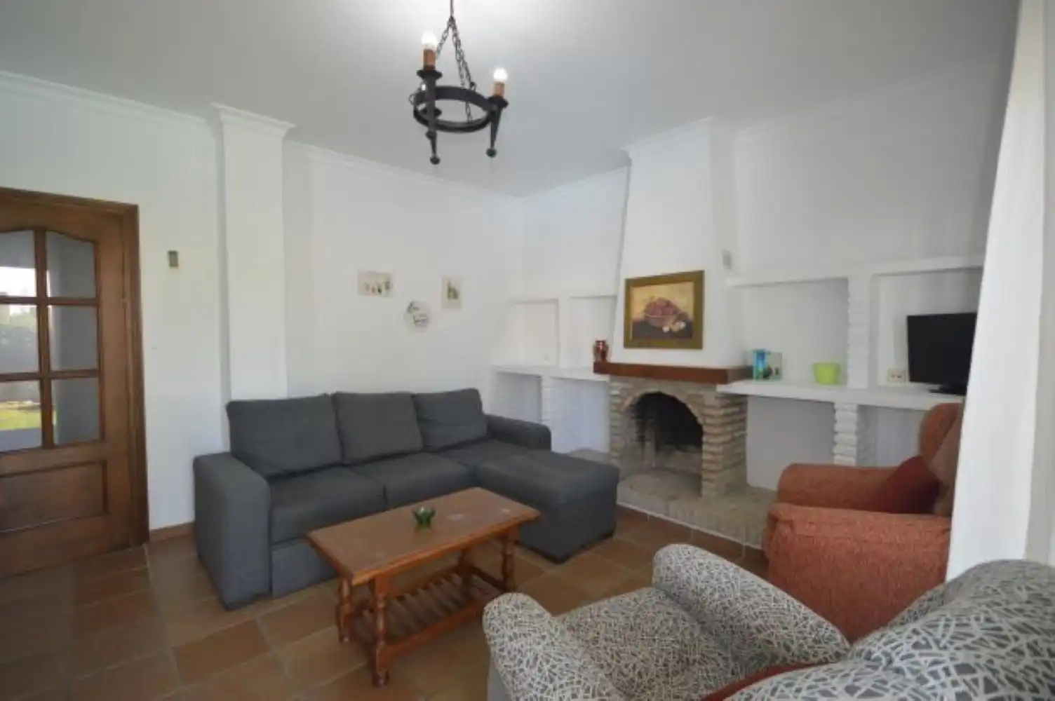 Sala de estar de Casa adosada de alquiler en Conil de la Frontera con Aire acondicionado, Jardín privado y Terraza