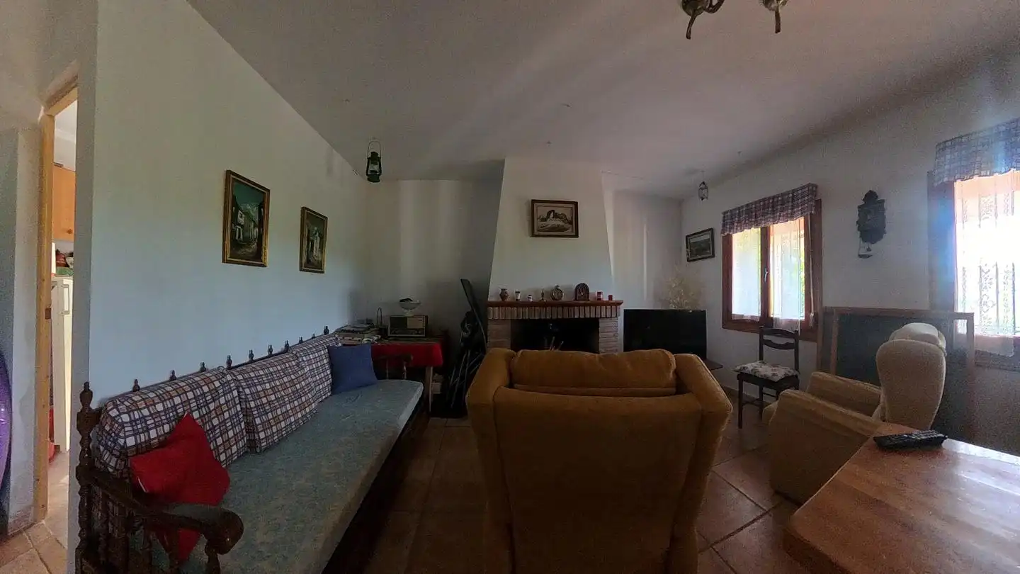 Sala d'estar de Casa o xalet en venda en Robledo amb Terrassa i Balcó