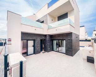 Exterior view of Single-family semi-detached for sale in Benijófar  with Air Conditioner, Terrace and Swimming Pool