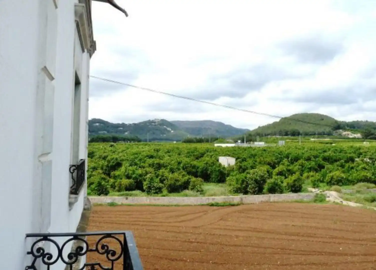 Vista exterior de Casa o xalet en venda en Benifairó de la Valldigna amb Calefacció, Jardí privat i Terrassa
