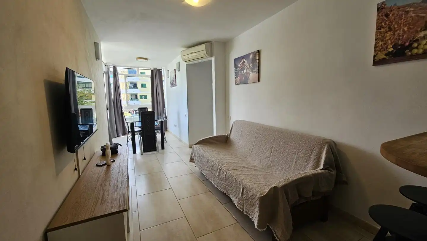 Living room of Flat for sale in San Bartolomé de Tirajana  with Air Conditioner, Furnished and Community pool