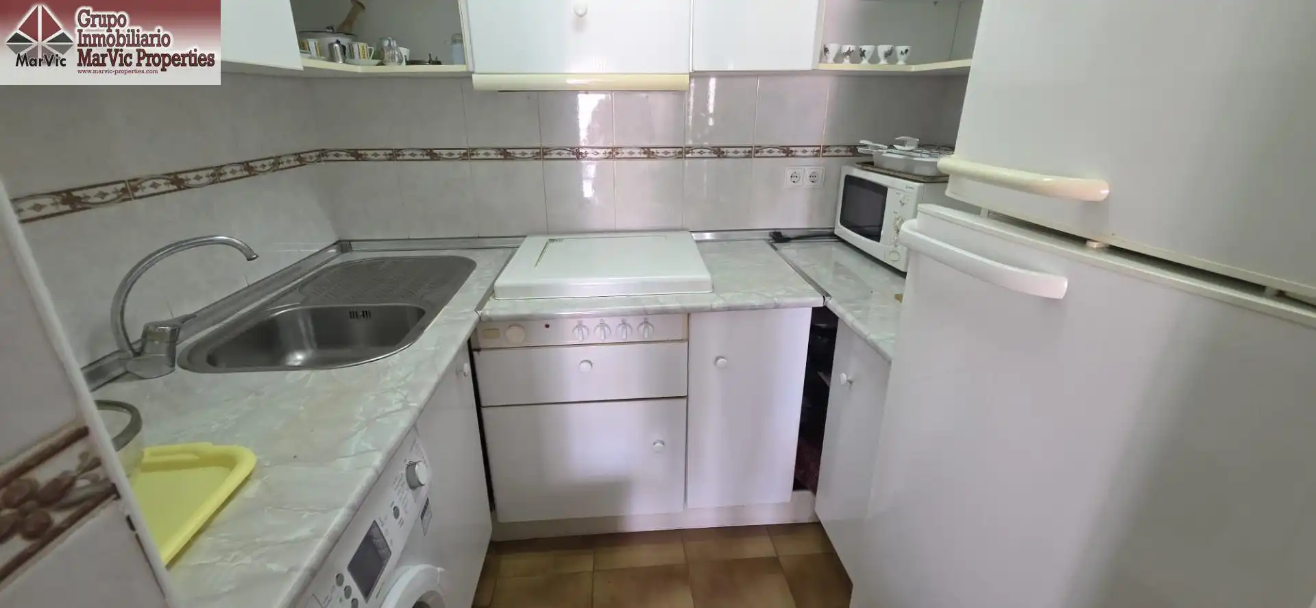 Cocina de Apartamento en venta en Benidorm con Aire acondicionado, Jardín privado y Amueblado