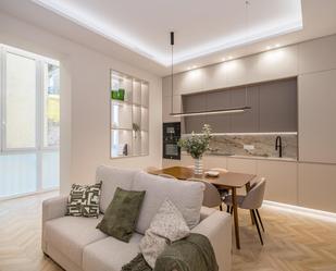 Living room of Planta baja for sale in  Madrid Capital  with Air Conditioner, Heating and Terrace