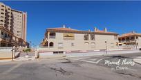 Vista exterior de Casa adosada en venda en La Manga del Mar Menor amb Aire condicionat, Terrassa i Balcó