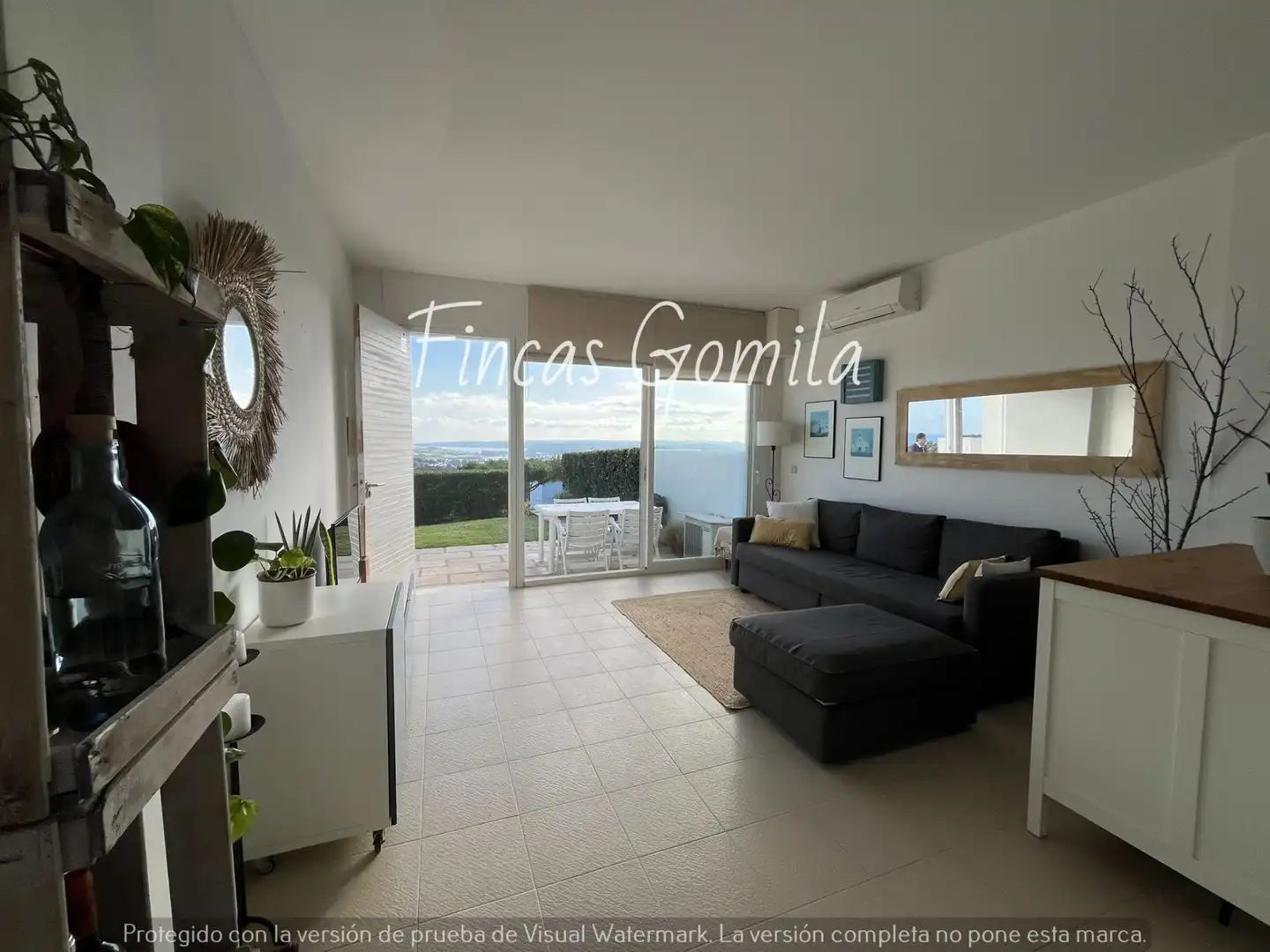 Sala d'estar de Apartament en venda en Es Mercadal amb Jardí privat, Terrassa i Moblat