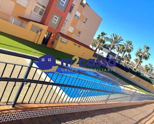 Swimming pool of Flat for sale in Águilas  with Air Conditioner, Terrace and Community pool