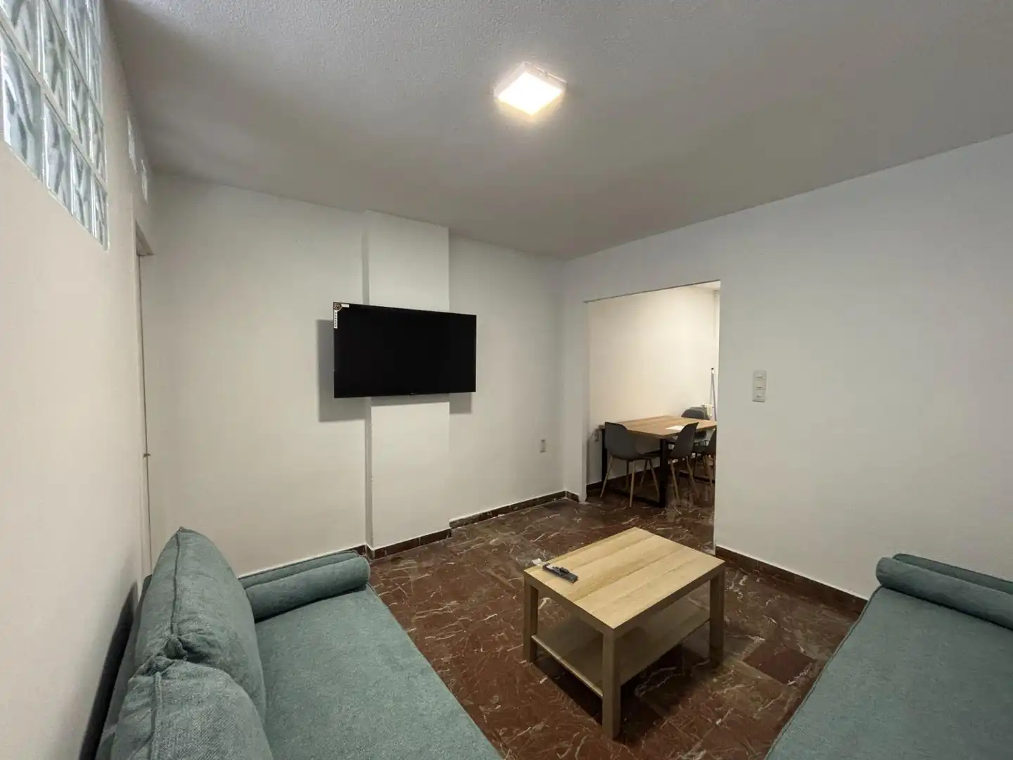 Sala de estar de Piso para compartir en Granada con Calefacción y Amueblado