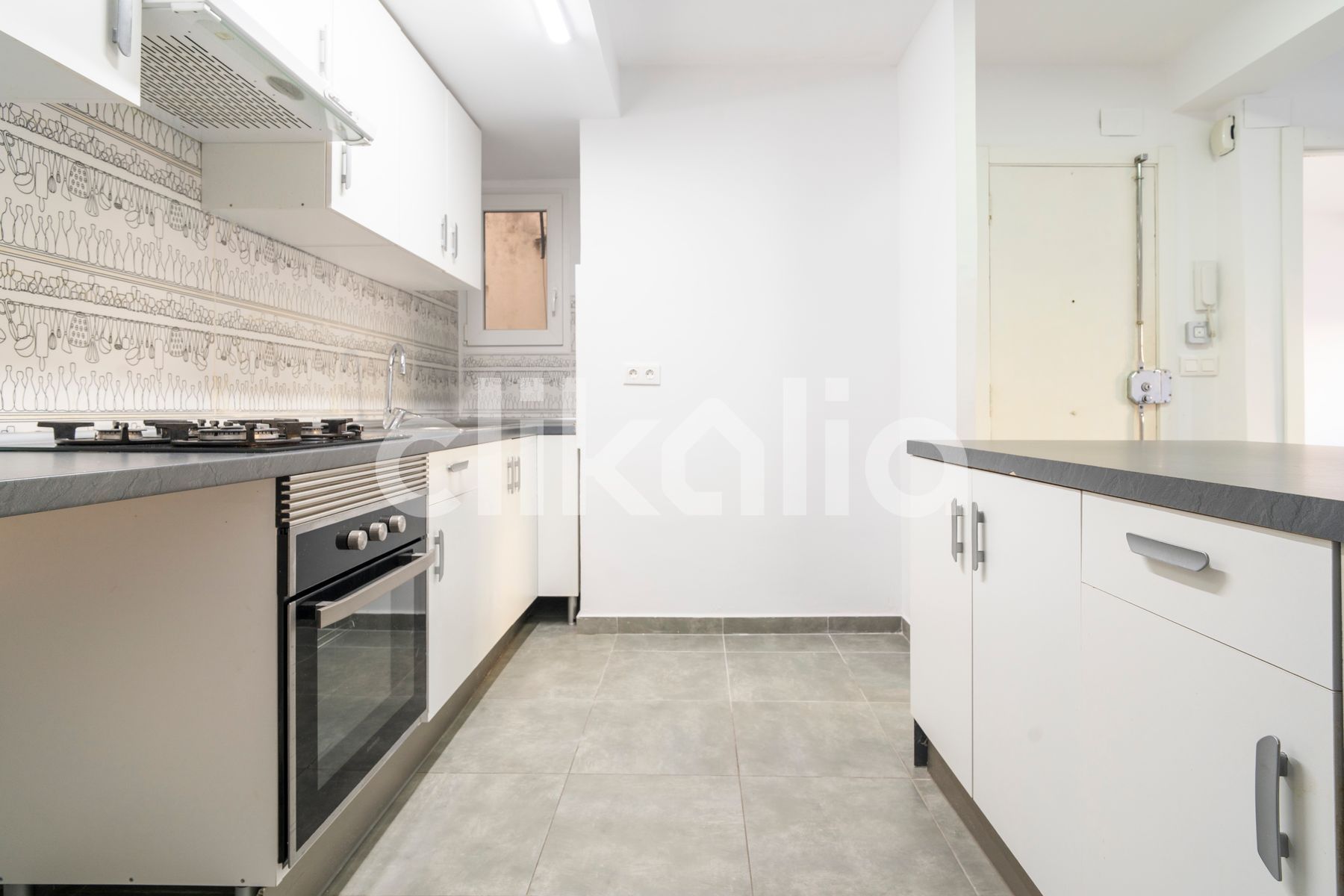 Kitchen of Flat to rent in Torrent  with Air Conditioner