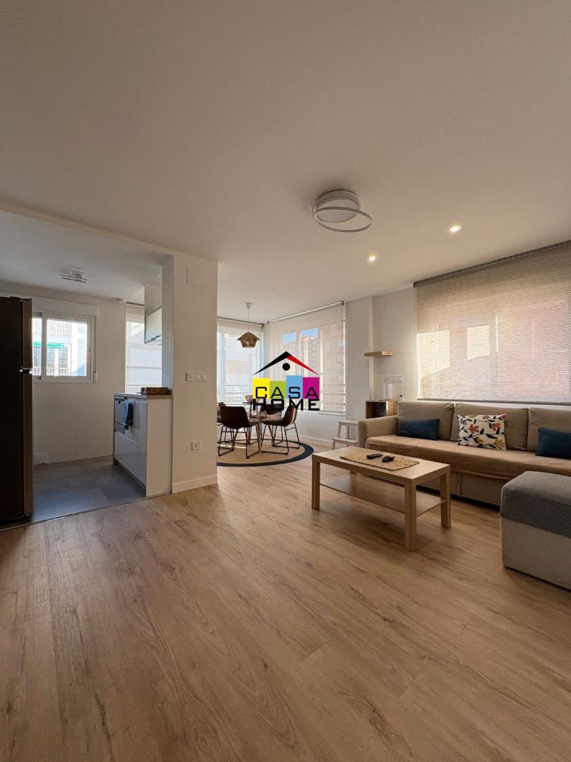 Sala d'estar de Apartament en venda en Benicasim / Benicàssim amb Jardí privat, Moblat i Piscina comunitària
