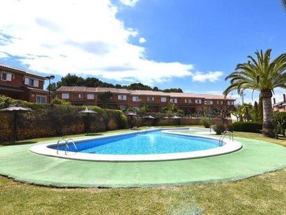 Swimming pool of Single-family semi-detached for sale in L'Alfàs del Pi  with Air Conditioner, Heating and Private garden