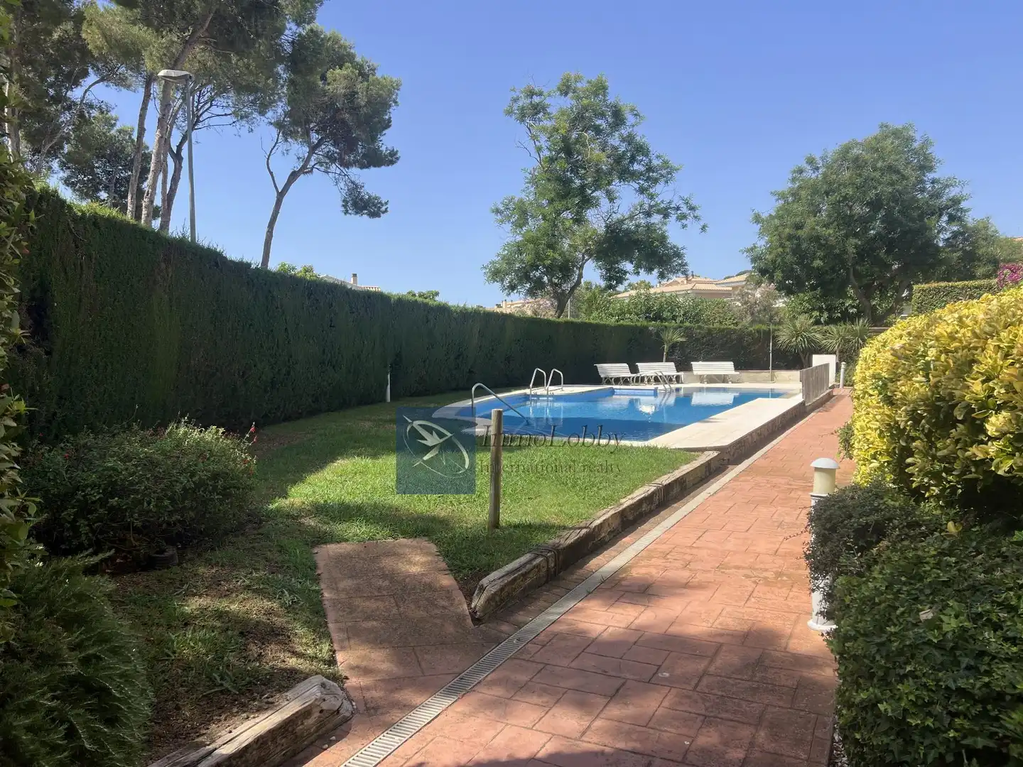 Piscina de Apartament de lloguer en Castell d'Aro, Platja d'Aro i s'Agaró amb Aire condicionat, Terrassa i Piscina comunitària