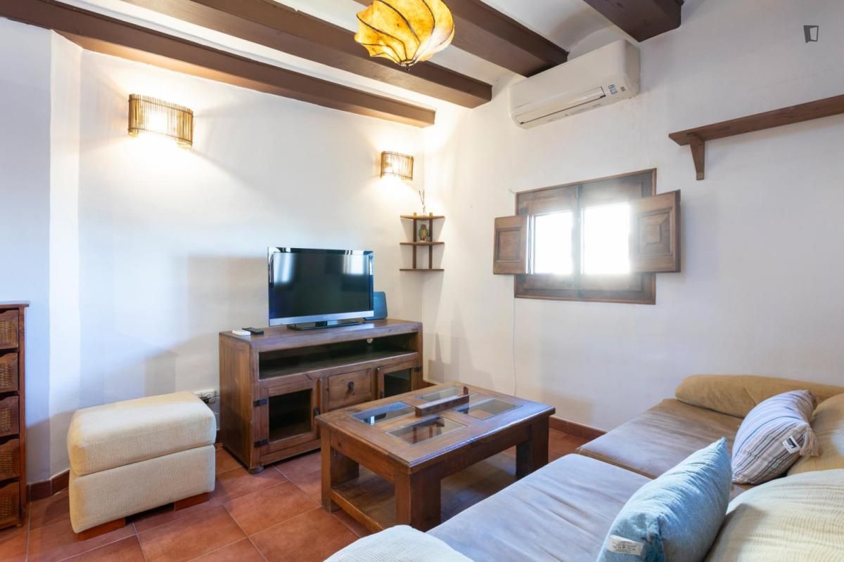 Sala d'estar de Estudi de lloguer en  Barcelona Capital amb Aire condicionat, Moblat i Forn