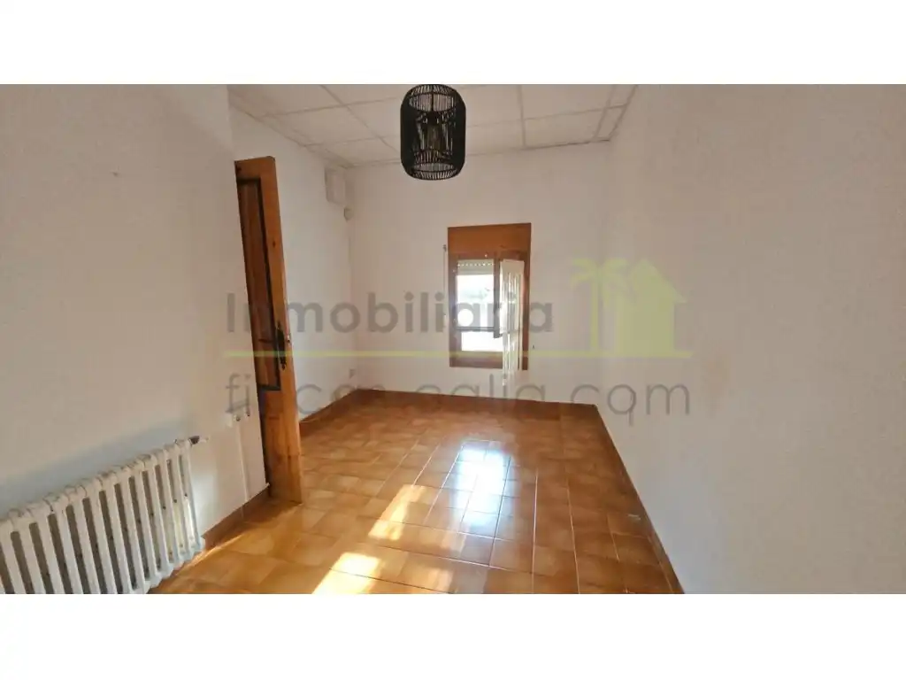 Sala d'estar de Casa o xalet en venda en Vinaròs amb Calefacció, Jardí privat i Terrassa
