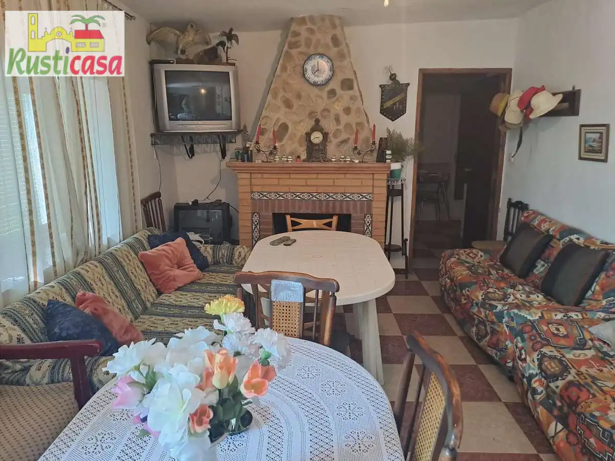Sala d'estar de Casa o xalet en venda en Guarromán amb Traster, Piscina i Moblat