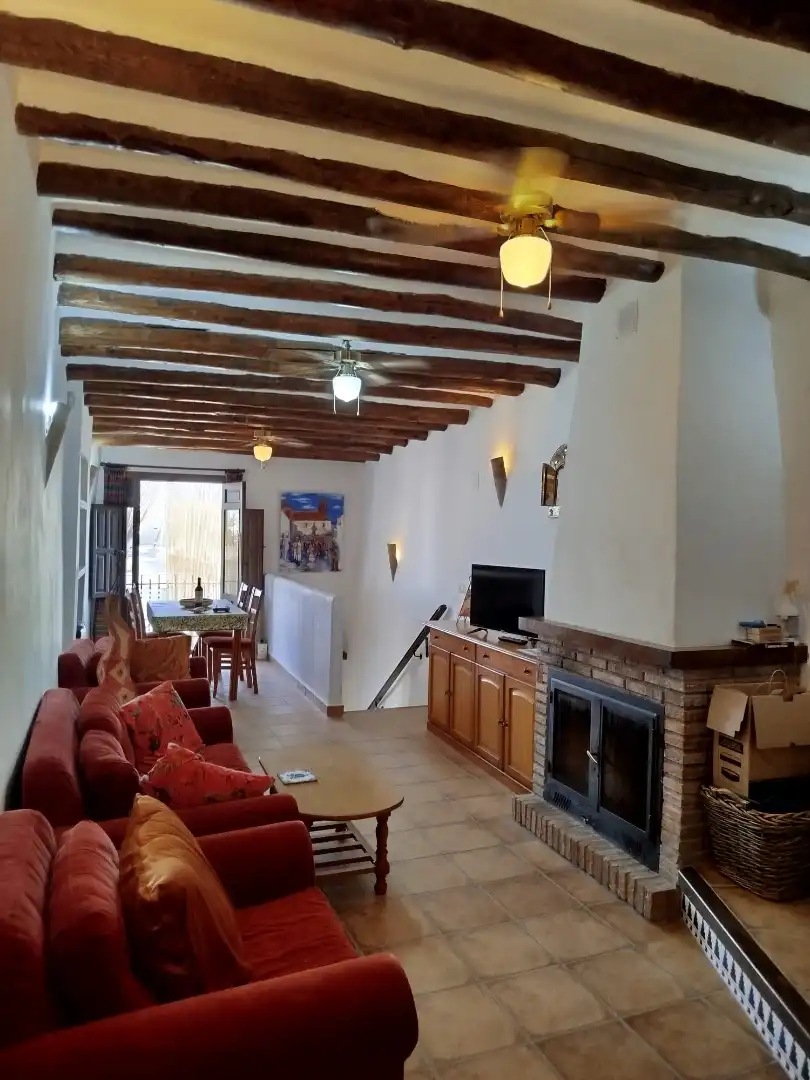 Sala d'estar de Casa adosada en venda en Nevada amb Calefacció, Terrassa i Moblat