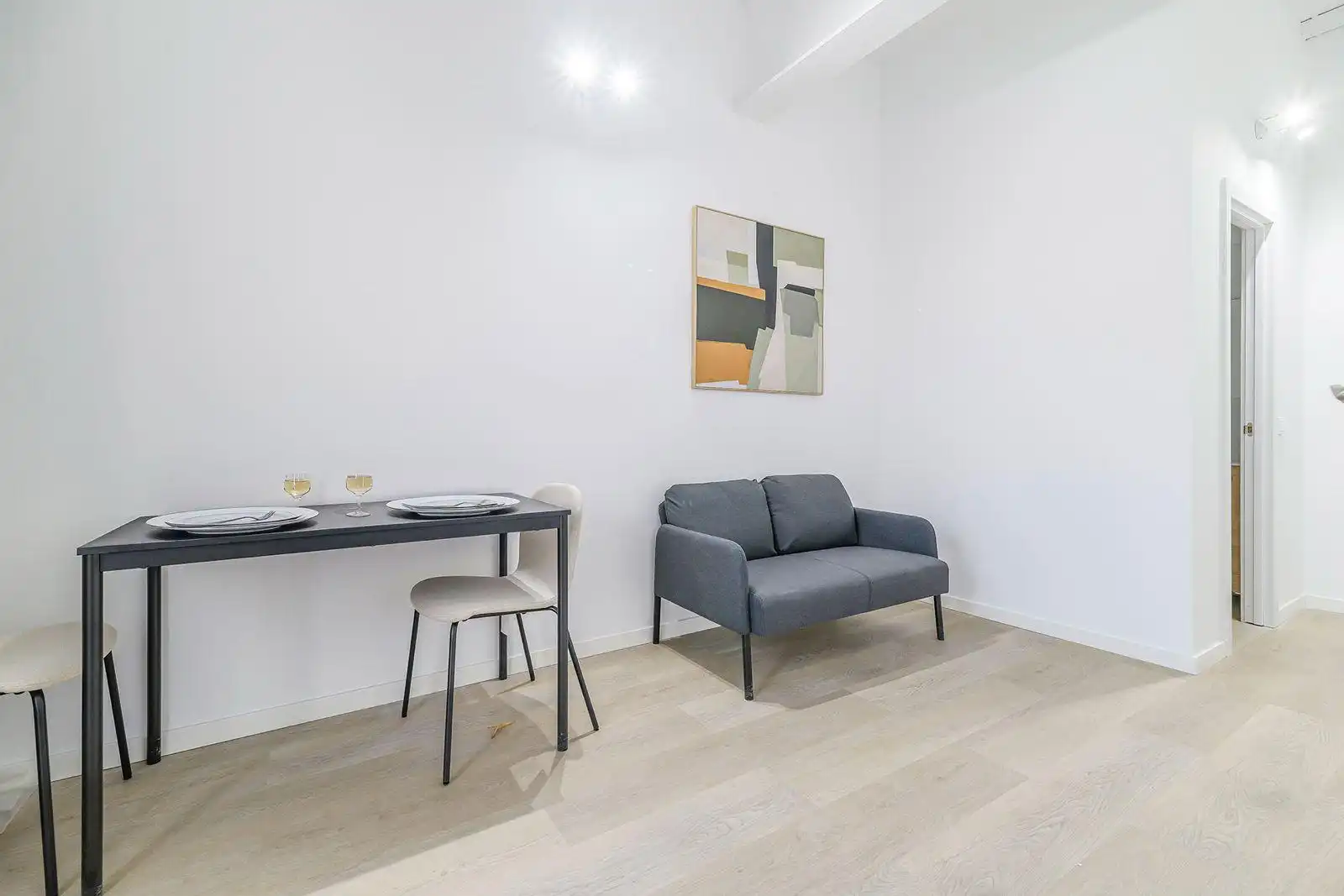 Sala d'estar de Local en venda en Santa Coloma de Gramenet amb Aire condicionat, Parquet i Moblat