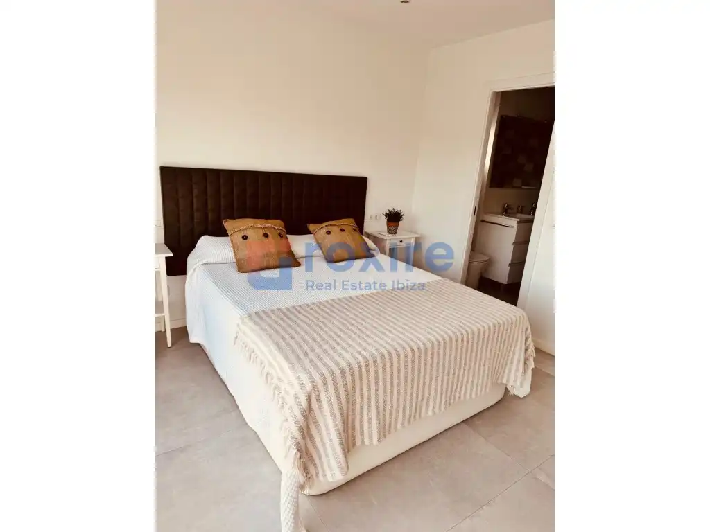 Dormitori de Dúplex de lloguer en Sant Josep de sa Talaia amb Aire condicionat, Jardí privat i Terrassa