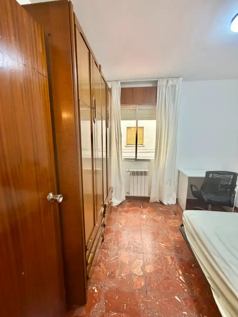 Bedroom of Flat for share in Jaén  with Air Conditioner, Heating and Furnished