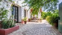 Vista exterior de Finca rústica en venda en Alcalá del Río amb Aire condicionat, Calefacció i Jardí privat