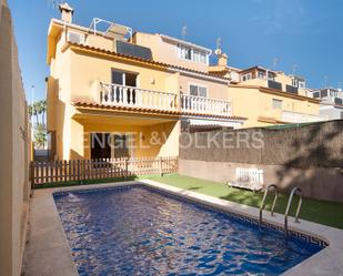 Exterior view of Single-family semi-detached for sale in Castellón de la Plana / Castelló de la Plana  with Air Conditioner, Terrace and Swimming Pool