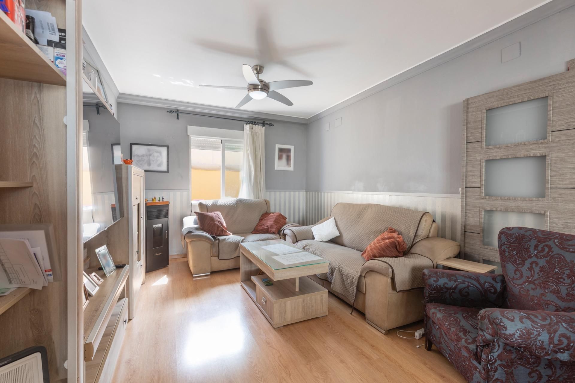 Sala de estar de Casa adosada en venta en Maracena