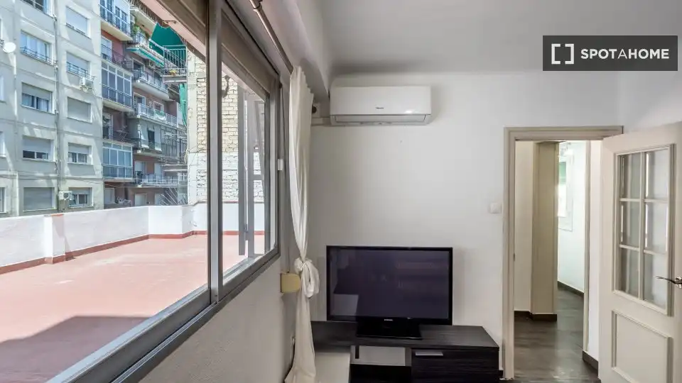 Sala de estar de Apartamento para compartir en Granada con Aire acondicionado, Calefacción y Terraza