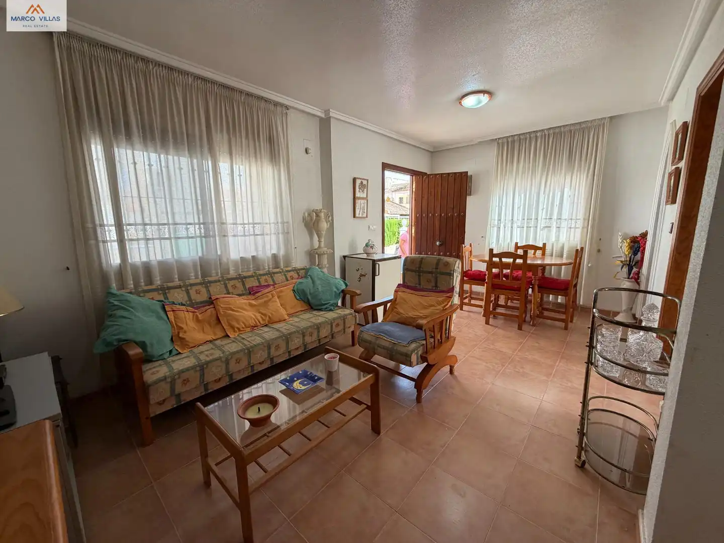 Sala de estar de Casa adosada en venta en Guardamar del Segura con Jardín privado, Terraza y Amueblado
